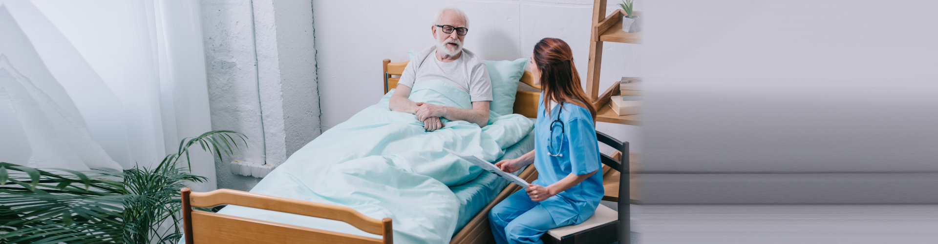 Old man patient and nurse discussing news from newspaper